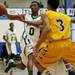 Huron junior Antonio Henry passes in the first half of the game on Friday, March 8. Daniel Brenner I AnnArbor.com